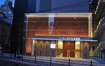Hotel Front - Evening/Night