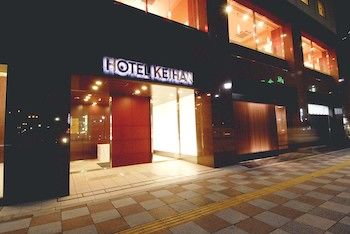 Hotel Front - Evening/Night