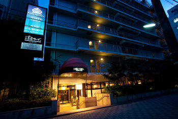 Hotel Front - Evening/Night