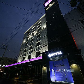 Hotel Front - Evening/Night