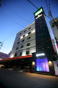 Hotel Front - Evening/Night