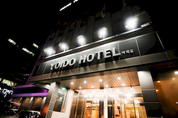 Hotel Front - Evening/Night