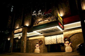 Hotel Front - Evening/Night