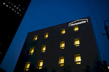 Hotel Front - Evening/Night