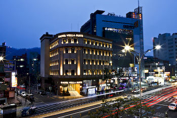 Hotel Front - Evening/Night