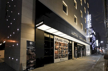 Hotel Front - Evening/Night