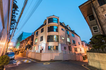Hotel Front - Evening/Night