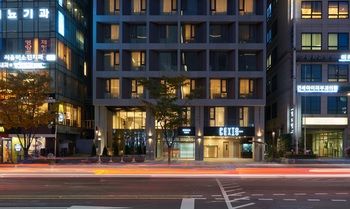 Hotel Front - Evening/Night
