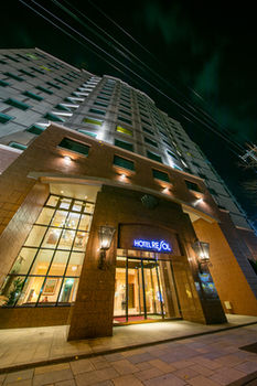 Hotel Front - Evening/Night
