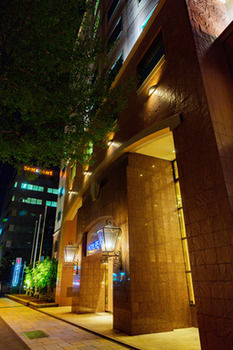 Hotel Front - Evening/Night