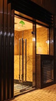 Hotel Front - Evening/Night