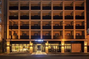 Hotel Front - Evening/Night