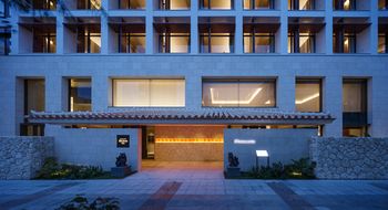 Hotel Front - Evening/Night