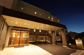 Hotel Front - Evening/Night