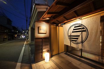 Hotel Front - Evening/Night
