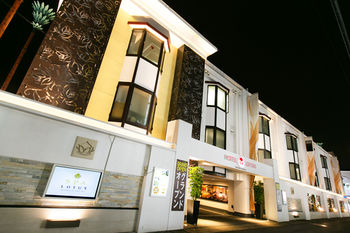 Hotel Front - Evening/Night