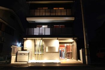 Hotel Front - Evening/Night