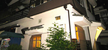 Hotel Front - Evening/Night