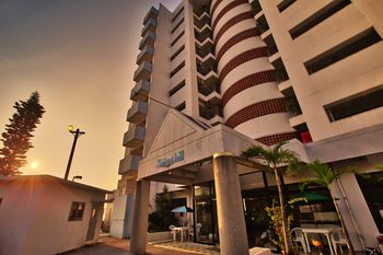 Hotel Front - Evening/Night