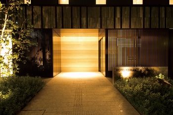 Hotel Front - Evening/Night