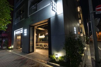 Hotel Front - Evening/Night