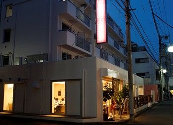Hotel Front - Evening/Night
