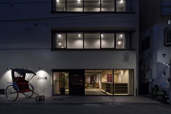 Hotel Front - Evening/Night