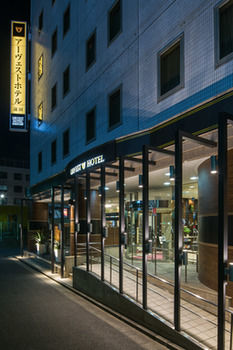 Hotel Front - Evening/Night