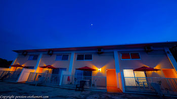 Hotel Front - Evening/Night