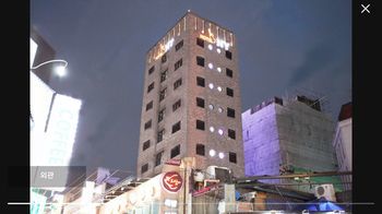 Hotel Front - Evening/Night