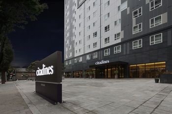 Hotel Front - Evening/Night