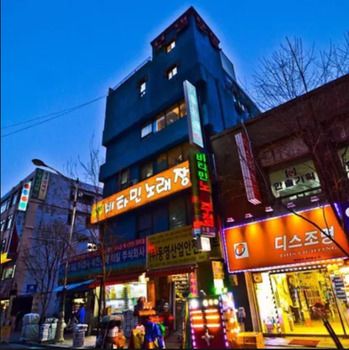 Hotel Front - Evening/Night