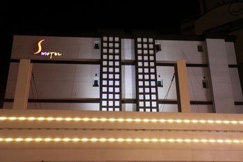 Hotel Front - Evening/Night