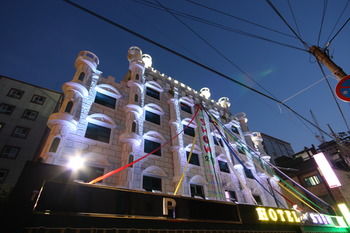 Hotel Front - Evening/Night