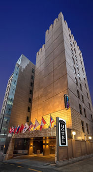 Hotel Front - Evening/Night