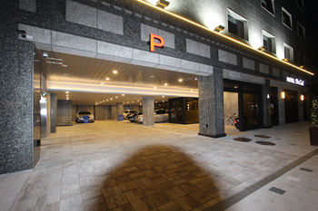 Hotel Front - Evening/Night