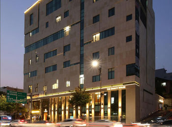 Hotel Front - Evening/Night