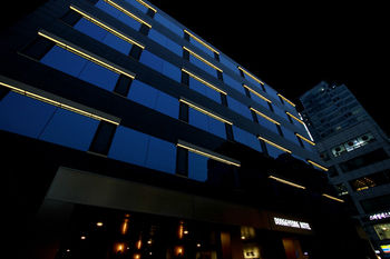 Hotel Front - Evening/Night