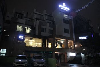 Hotel Front - Evening/Night
