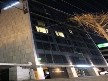 Hotel Front - Evening/Night