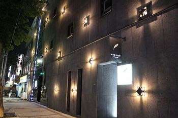 Hotel Front - Evening/Night