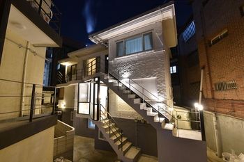Hotel Front - Evening/Night