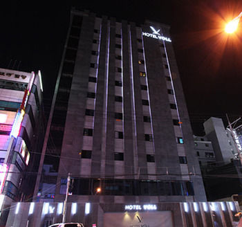 Hotel Front - Evening/Night
