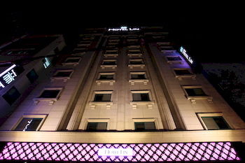 Hotel Front - Evening/Night