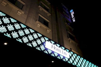 Hotel Front - Evening/Night