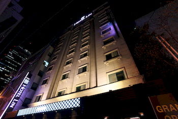 Hotel Front - Evening/Night