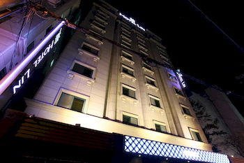 Hotel Front - Evening/Night