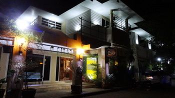Hotel Front - Evening/Night