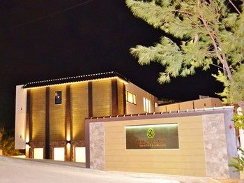 Hotel Front - Evening/Night