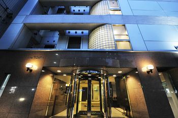 Hotel Front - Evening/Night